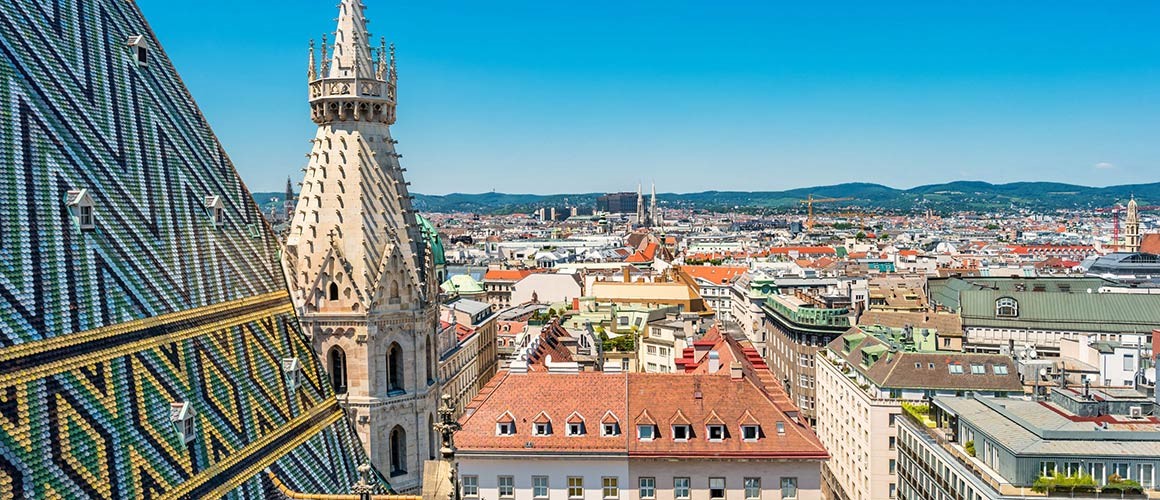 EANprecongressarticle2320x1000.jpg An image of St. Stephen's Cathedral and cityscape of downtown Vienna, Austria