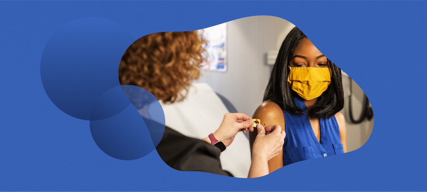 NB Migraine Monthly Article No 6_NPS-TPE-NP-00275_BANNER-1150x500.jpg Person putting a patch on the arm of a woman wearing a mask.