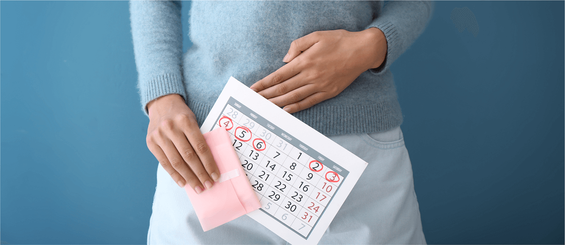 Article 8 AAN21_NPS-TPE-NP-00322_HEADER_1160x500px.png Woman touching her abdomen while holding a calendar and a sanitary napkin.