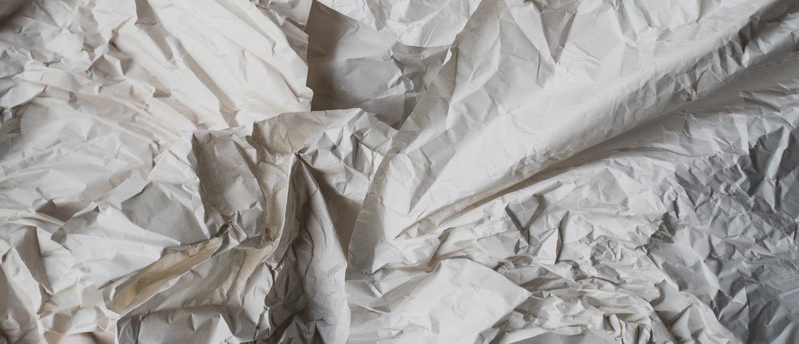 Crumpled white paper.