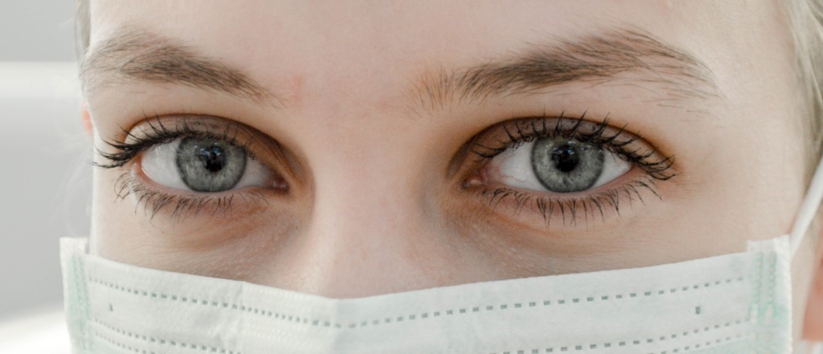 woman_wearing_mask_1160x500.jpg Face of woman who is wearing a mask.