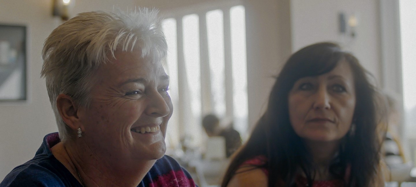 Two women giving an interview